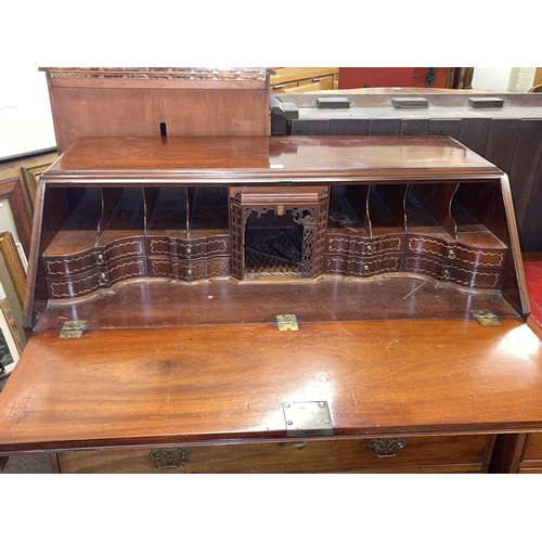 358 - Georgian mahogany four drawer bureau, 112cm by 107cm by 56cm.