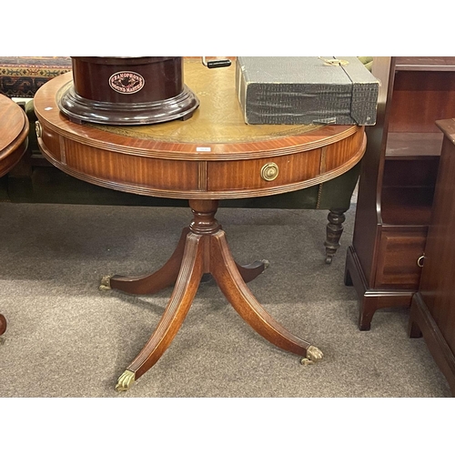 366 - Mahogany four drawer pedestal drum table with leather inset top, 77cm by 92cm diameter.