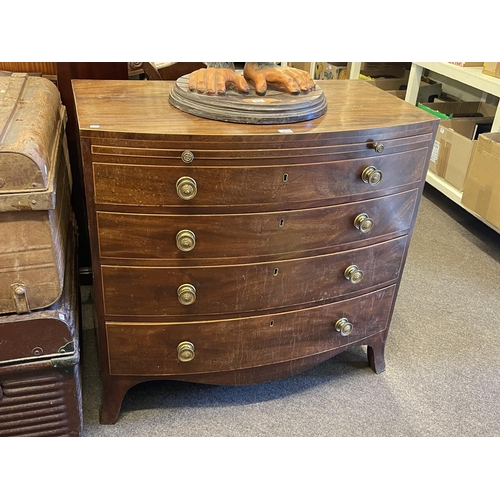 369 - Georgian mahogany and line inlaid bow front chest having brush slide above four long graduated drawe... 