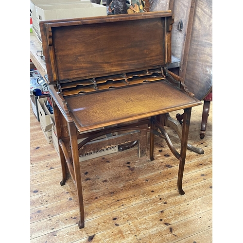 389 - Mahogany cantilever action writing desk, 79cm by 74cm by 44cm.