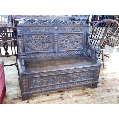 400 - Victorian carved oak box hall bench, 101cm by 121cm.