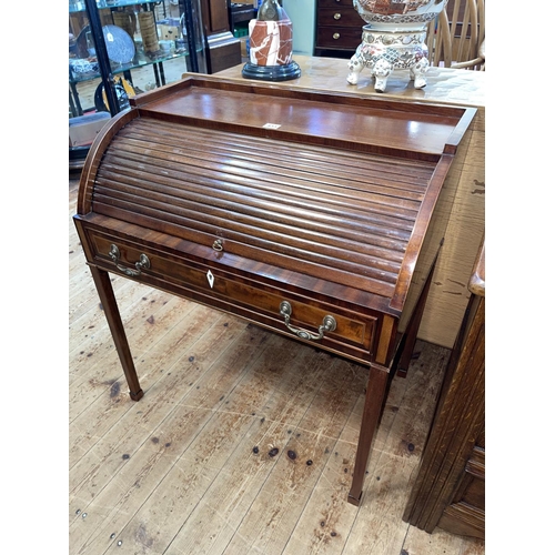 433 - Edwardian mahogany cylinder desk having single drawer raised on square tapering legs, 80cm by 71cm b... 