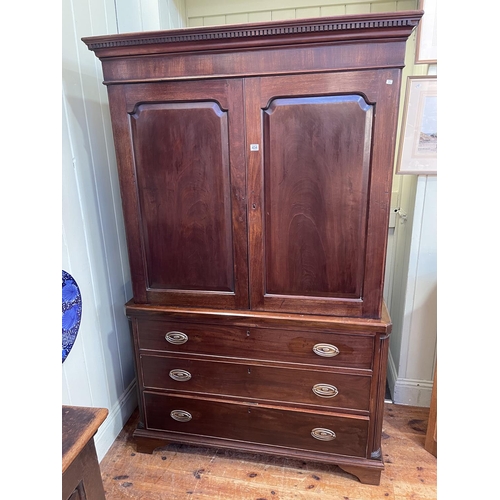 434 - Antique mahogany linen press having two fielded panel doors above one faux and two long drawers on b... 