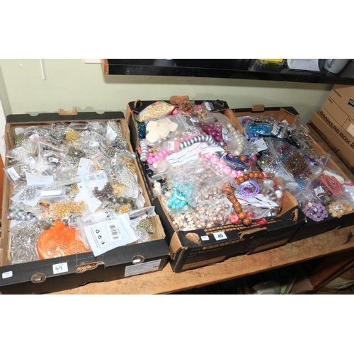 49 - Three boxes of costume jewellery and accessories.