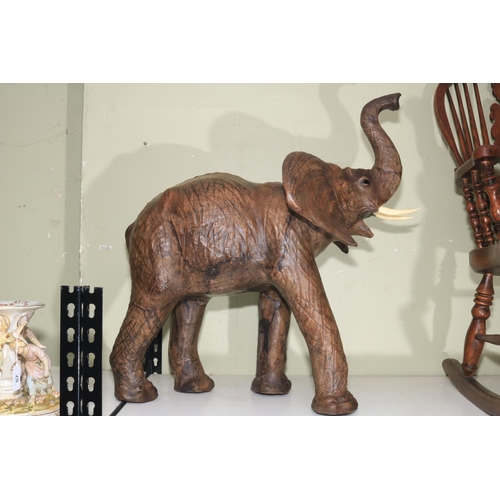 58 - Liberty style leather elephant, 68cm high.