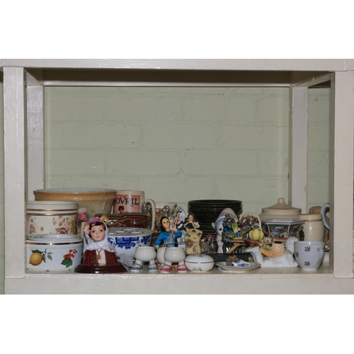 82 - Full shelf of assorted china including candle snuffers, figurines, dinnerwares, Ringtons, assorted m... 