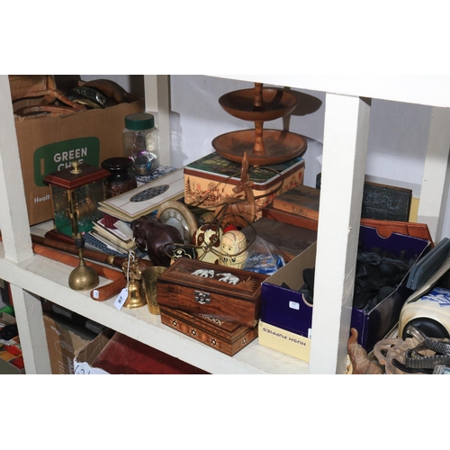 87 - Full shelf of collectables including chess pieces and boards, metalware, carved wood pieces includin... 