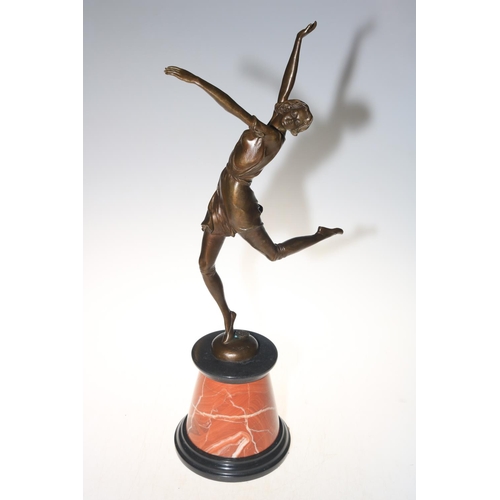 156 - Art Deco style bronze of dancing lady on marble plinth, 65cm high.