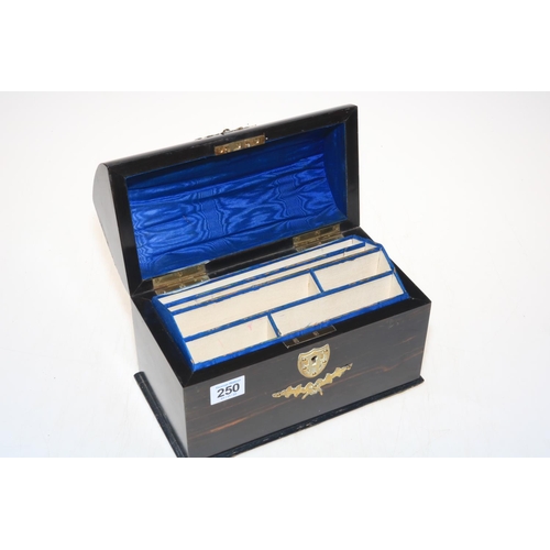 250 - Coromandel arch top stationery box with fitted interior and brass mounts.