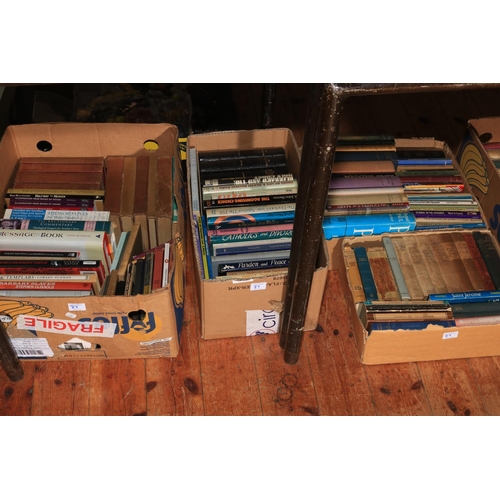 27 - Seven boxes of assorted books.