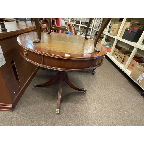 371 - Mahogany four drawer pedestal drum table with leather inset top, 77cm by 92cm diameter.