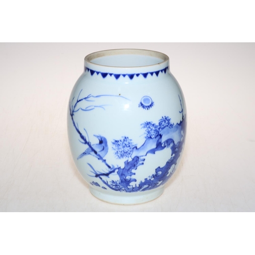 142 - Chinese blue and white transitional period vase decorated with bird in floral landscape, 21.5cm.