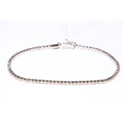 163 - Diamond tennis bracelet set in 18 carat white gold.