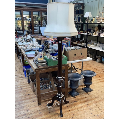 373 - Mahogany reeded column triform standard lamp and shade.