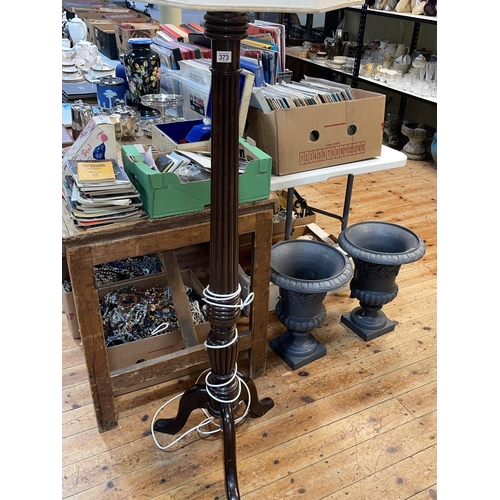 373 - Mahogany reeded column triform standard lamp and shade.
