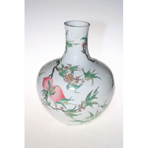 178 - Large Chinese ovoid vase decorated with fruit trees and famille rose on white ground, 35cm.