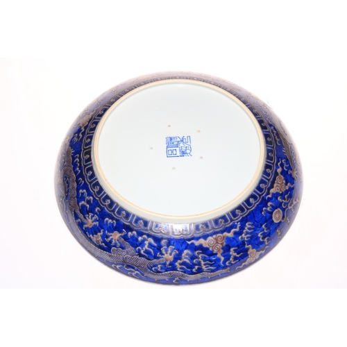 179 - Large Chinese charger decorated with dragon design, 41.5cm diameter.