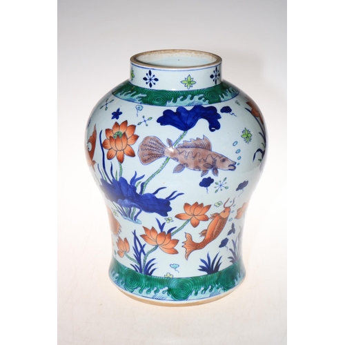 180 - Large Chinese vase of bulbous form decorated with fish and marine fauna, square mark to base, 34cm.