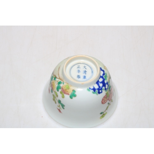 183 - Small Chinese tea cup decorated with chickens and famille rose, 8.5cm diameter.