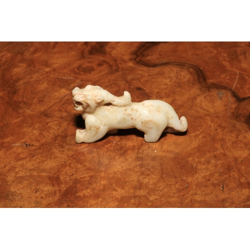 190 - Small Chinese white jade dragon, 7cm long.