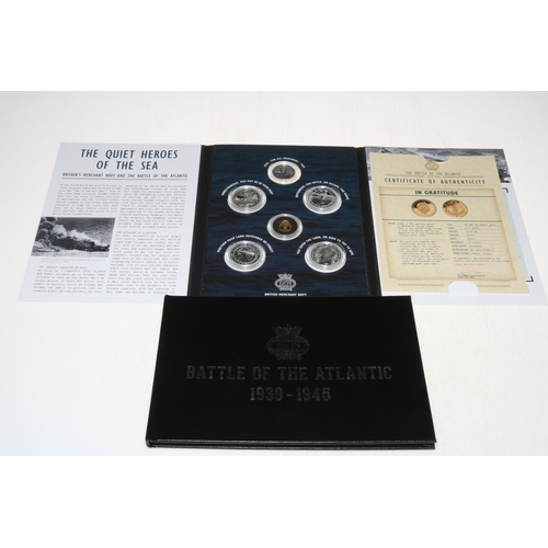 28 - The Battle of the Atlantic commemorative gold and silver coin set, comprising a 3.11g 24ct gold coin... 