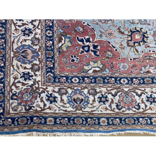 302 - Persian design wool carpet 3.60 by 2.65.