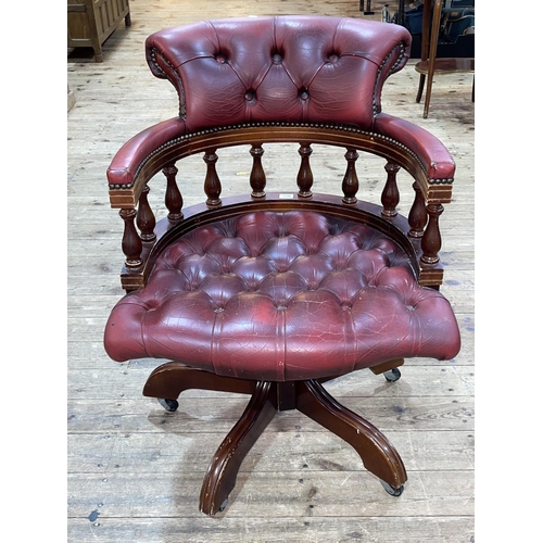 350 - Red buttoned leather Captains style swivel desk chair.