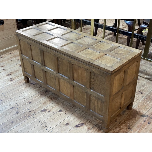 364 - Sid Pollard? panelled oak blanket box/storage chest, 56cm by 108cm by 39cm.