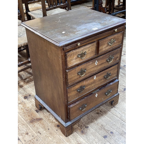 368 - Georgian mahogany Bachelors chest having brush slide above two short and three long drawers on shape... 