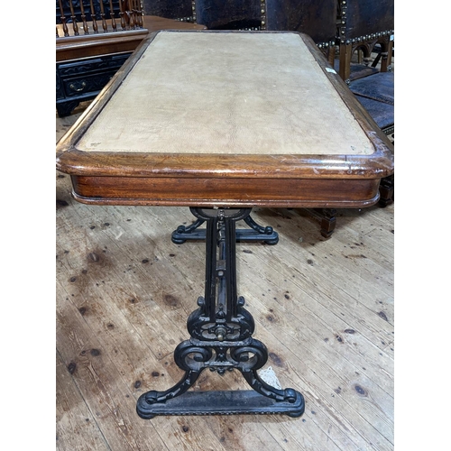 375 - Rectangular cast base pub table with leather inset top, 80cm by 99cm by 53cm.