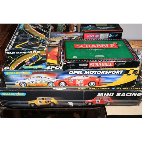 63 - Scalextric Opel Motorsport and Mini Racing sets and track, poker set and scrabble.