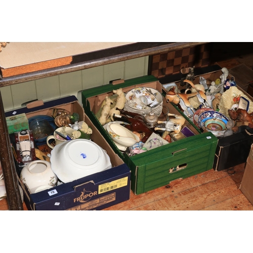 79 - Five boxes of decorative porcelain, chess board and pieces, glass, display cabinet, table lamp, etc.