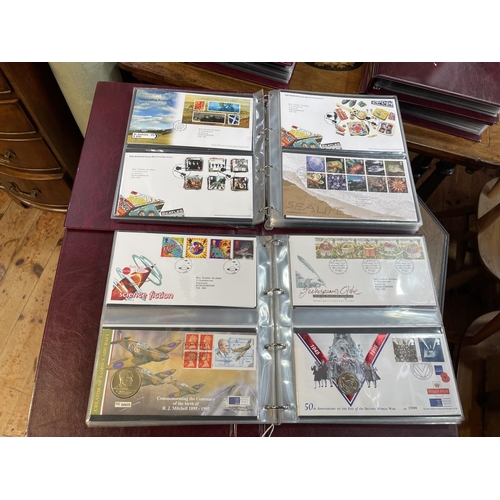 100 - Six albums of commemorative FDCs c2000's including Tallents House, Royal Mint covers including £1, £... 