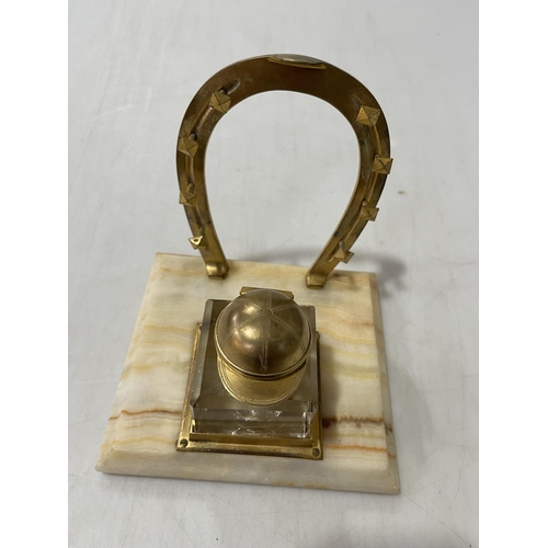 214 - Gilt jockey cap and horseshoe inkstand, 15cm across.