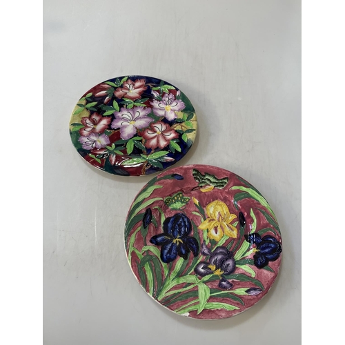 307 - Two large Maling plates with ornate relief floral decoration, 28cm.