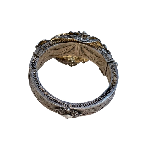 173 - Tibetan 19th Century silver filigree bangle with opening clasp.