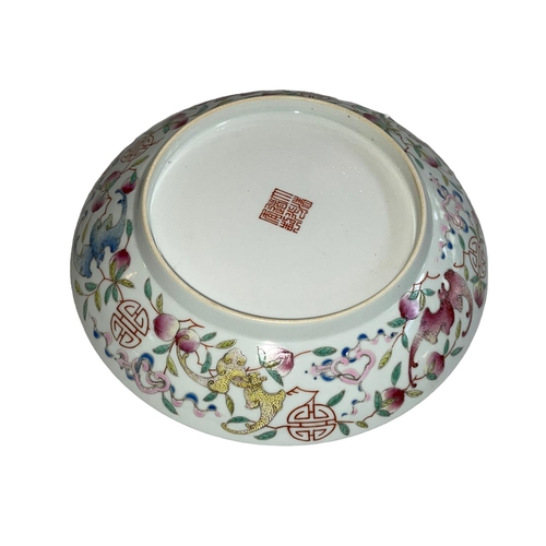 176 - Chinese porcelain plate decorated with bat and floral design, iron red character mark to base, 21cm.