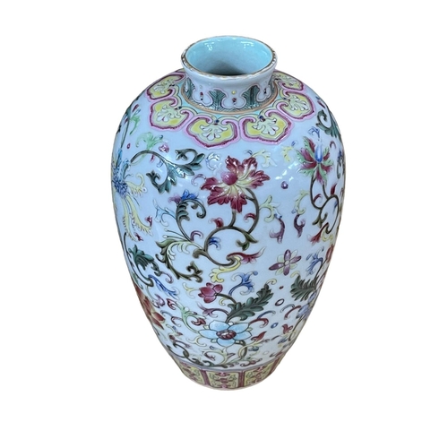 181A - Small Chinese famille rose decorated vase with iron red seal mark to base 15cm.