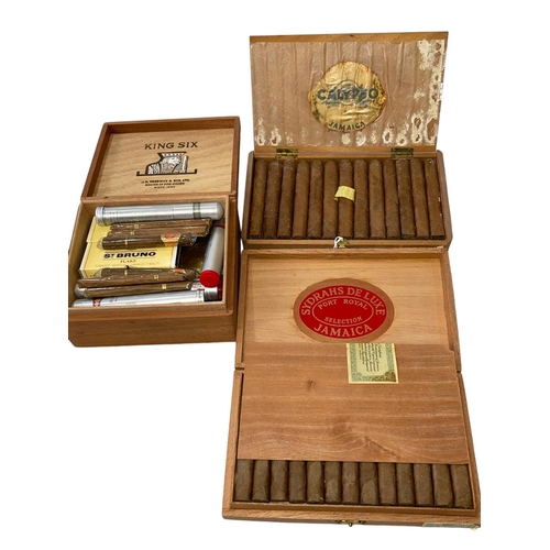 239 - Three boxes of cigars.