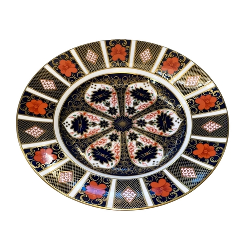 263 - Five Royal Crown Derby Imari 27cm plates, one of very slightly different design.