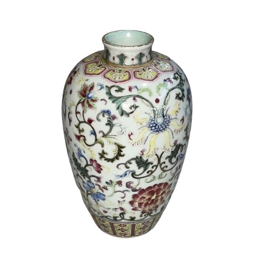 163 - Chinese Famille Rose decorated vase with Qianlong mark to base, 15cm.