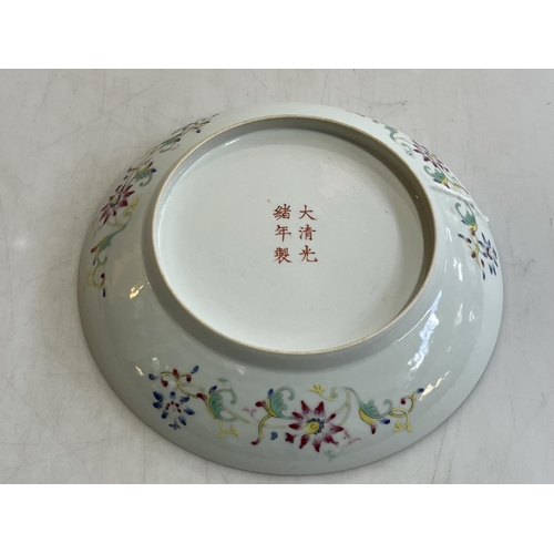 166 - Chinese plate with famille rose and bird decoration, six character mark to base, 21cm.