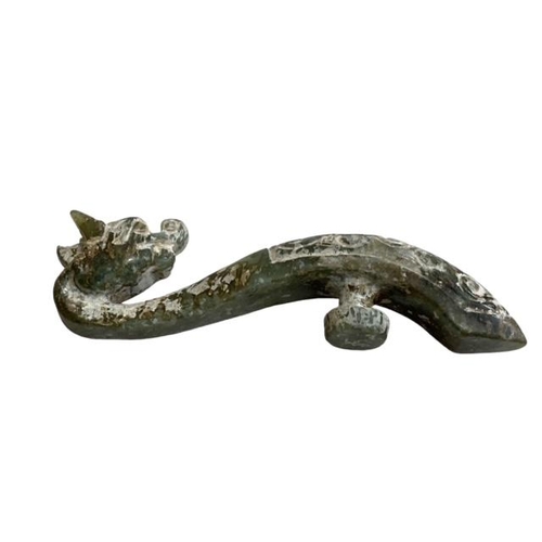 174 - Chinese green jade belt hook in the shape of a dragon, 10cm length.