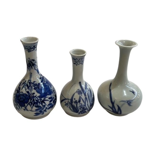 176 - Small Chinese jardiniere and three Chinese blue and white vases.