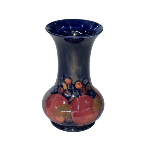 282 - Moorcroft Pomegranate vase, 18cm.