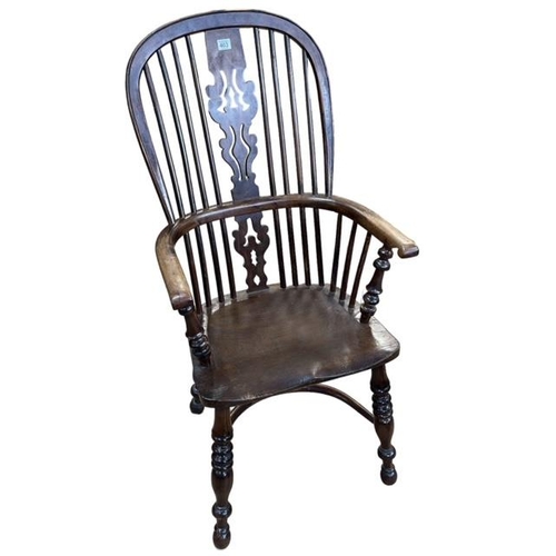 403 - Antique yew wood pierced splat back Windsor elbow chair.