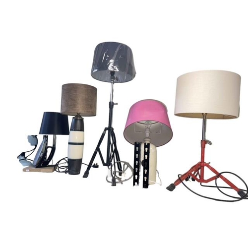 70 - Collection of novelty table lamps and a fan including an iron, ceramic water bottle, tripod base, et... 