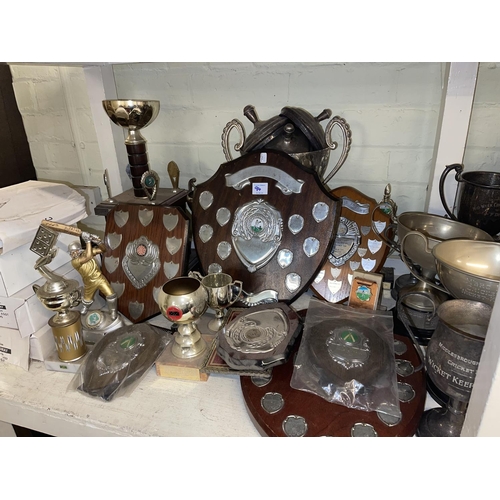 94 - Assorted metalwares including trophy's, cutlery and silver plate, cameras, medals and badges, etc.