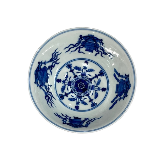 158 - Chinese porcelain bowl with Famille Rose and floral outer pattern and blue and white interior Guangx... 