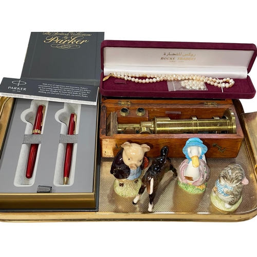 21 - Parker Sonnet Red pen set, portable microscope, pearl necklace and four Beswick figures.